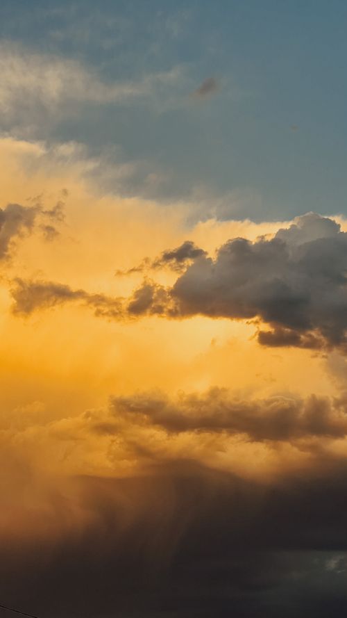 Free Dramatic sunset clouds illuminate the sky over Baku, Azerbaijan. Stock Photo