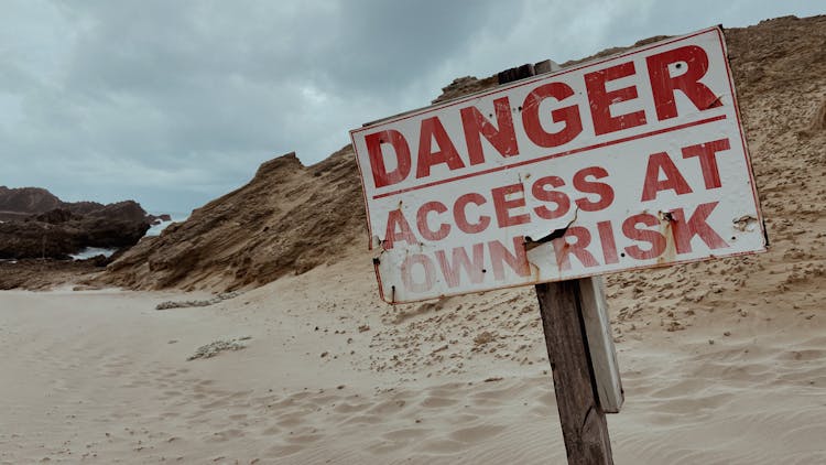 Danger Sign At A Beach
