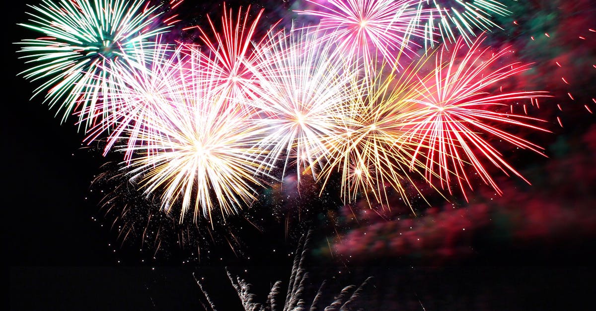 Spectacular fireworks display lighting up the night sky over Bournemouth Pier, England.