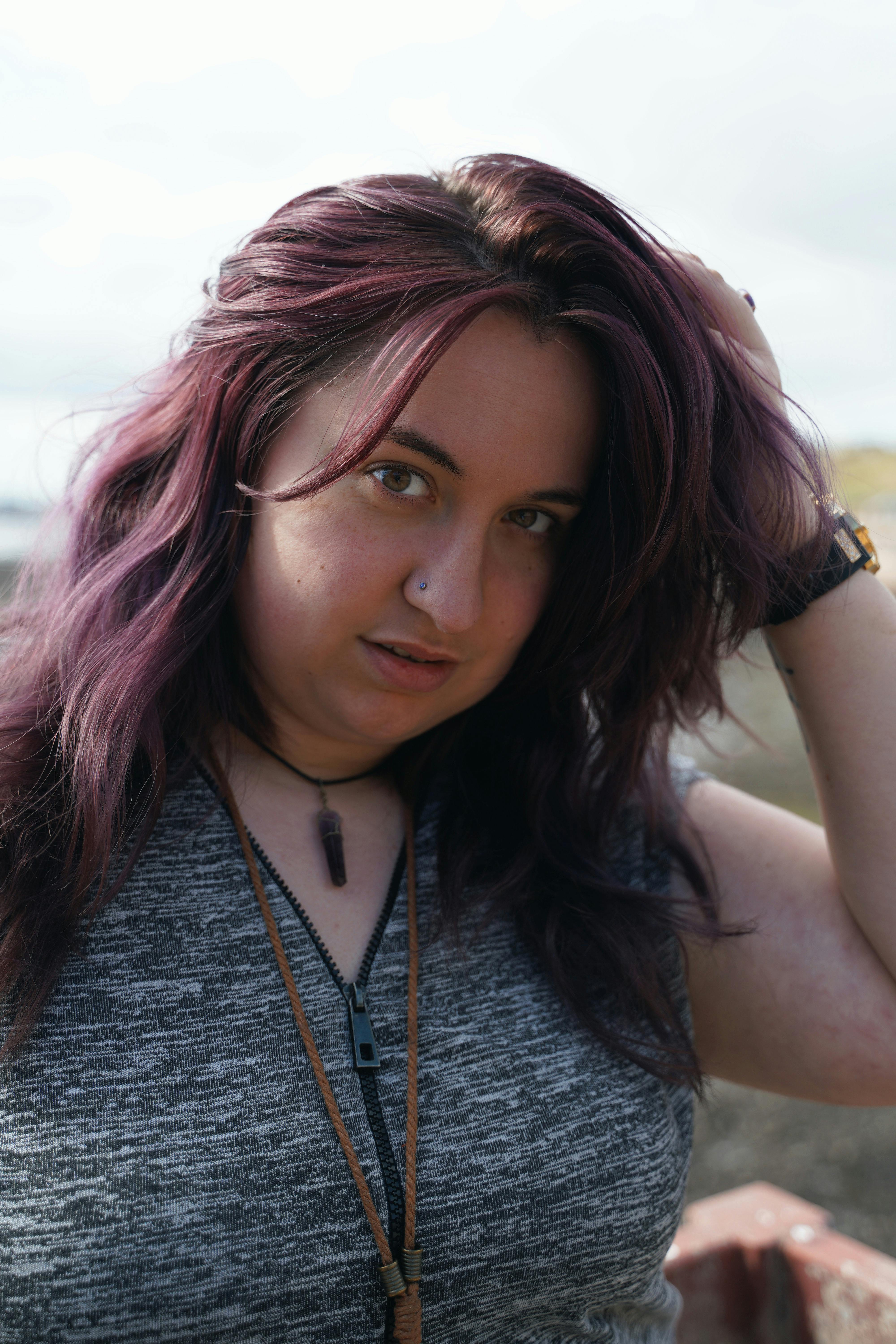 woman taking selfie wearing gray tank top by Ginger Girl. Photo stock -  StudioNow