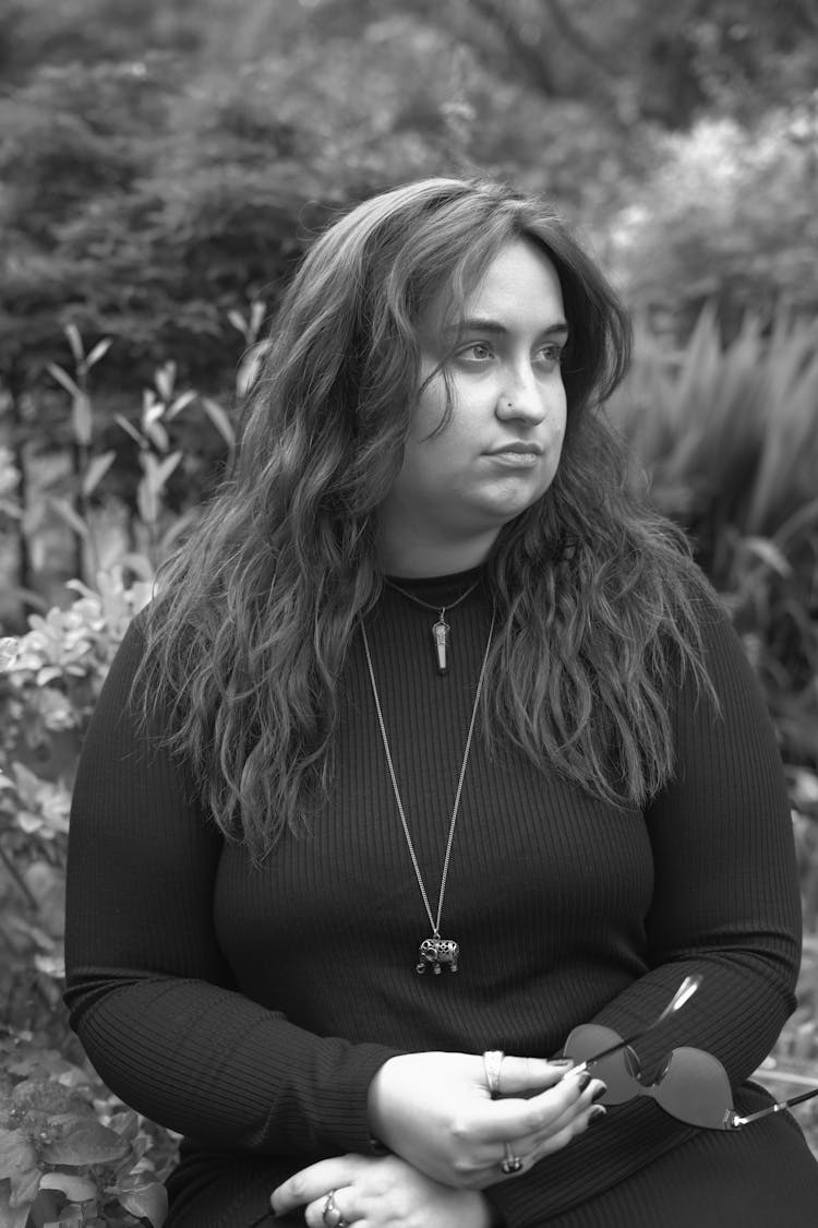 Curvy Woman Wearing A Long Sleeve Shirt