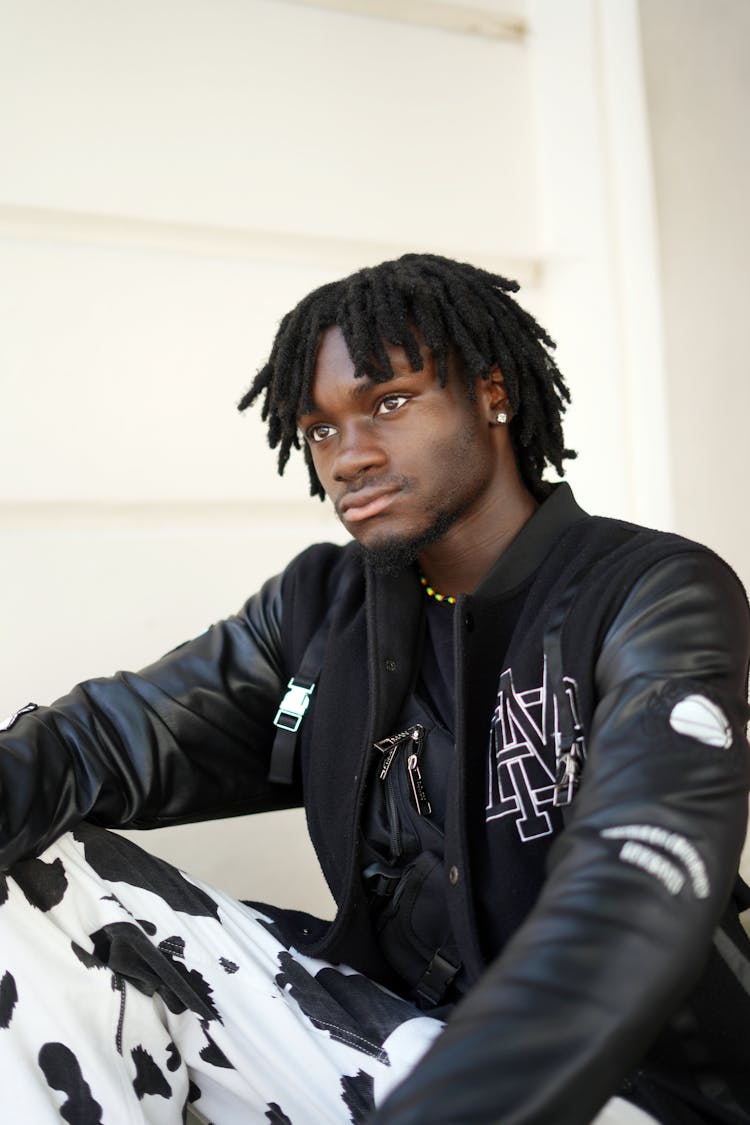 Young Man In Stylish Clothes Outdoors