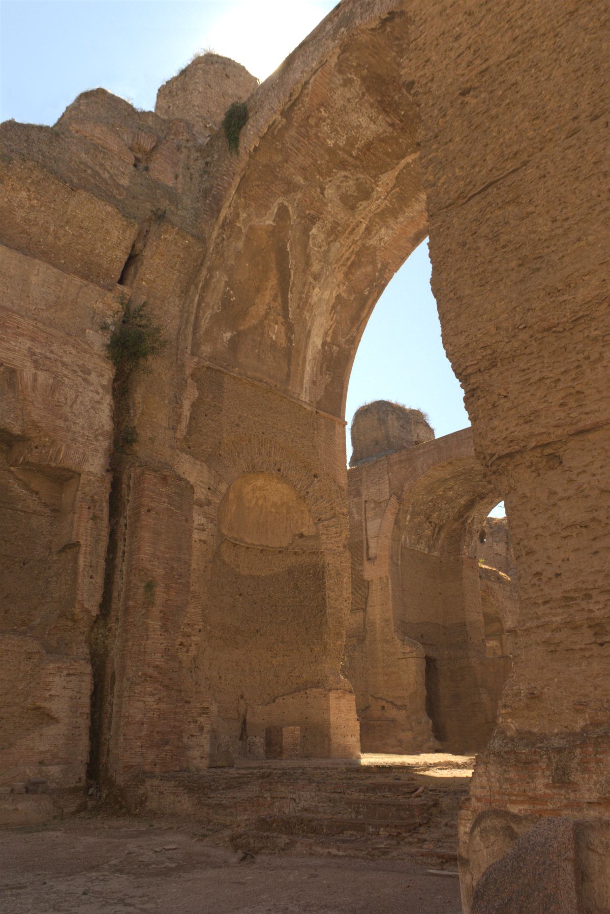 Ancient brick arches inside the Baths of Caracalla in Rome