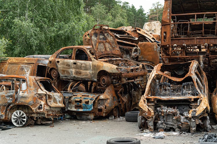 Pile Of Wrecked Cars In A Junkyard