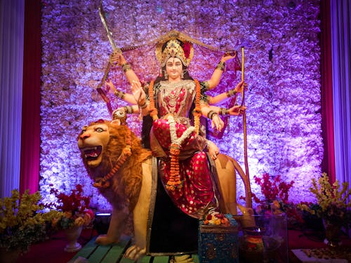 Sculpture of a Female Likeness on a Lion 