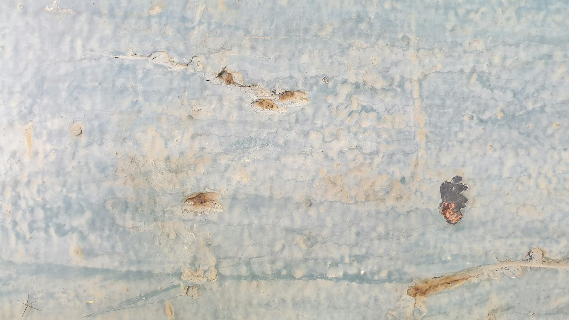 Close-up of an Old Wall with Defects and Holes