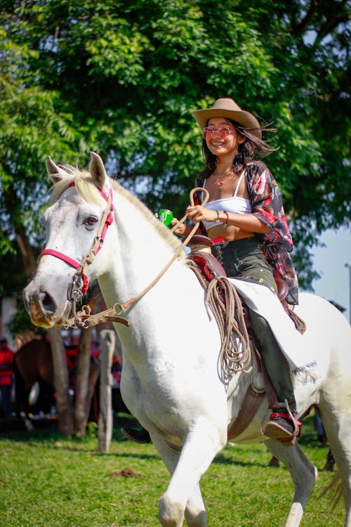 A Woman Riding a Horse