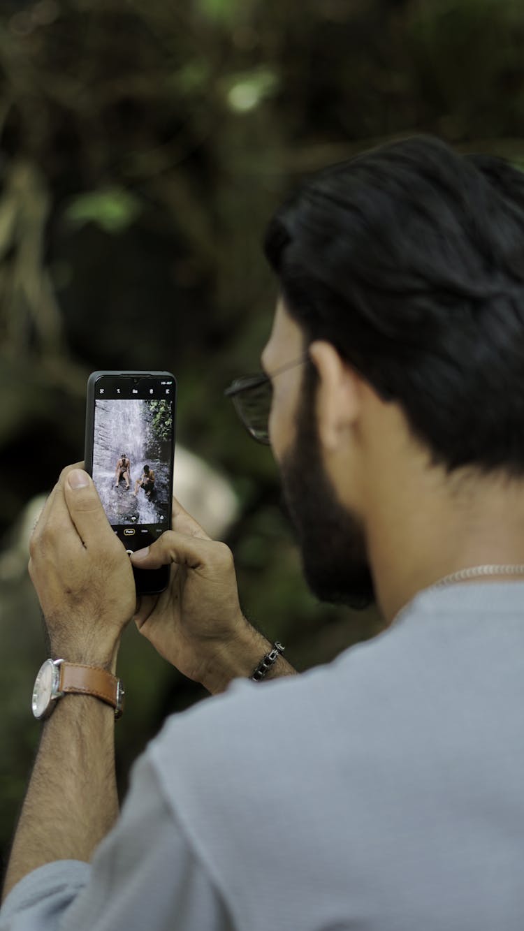 Man Holding A Cellphone