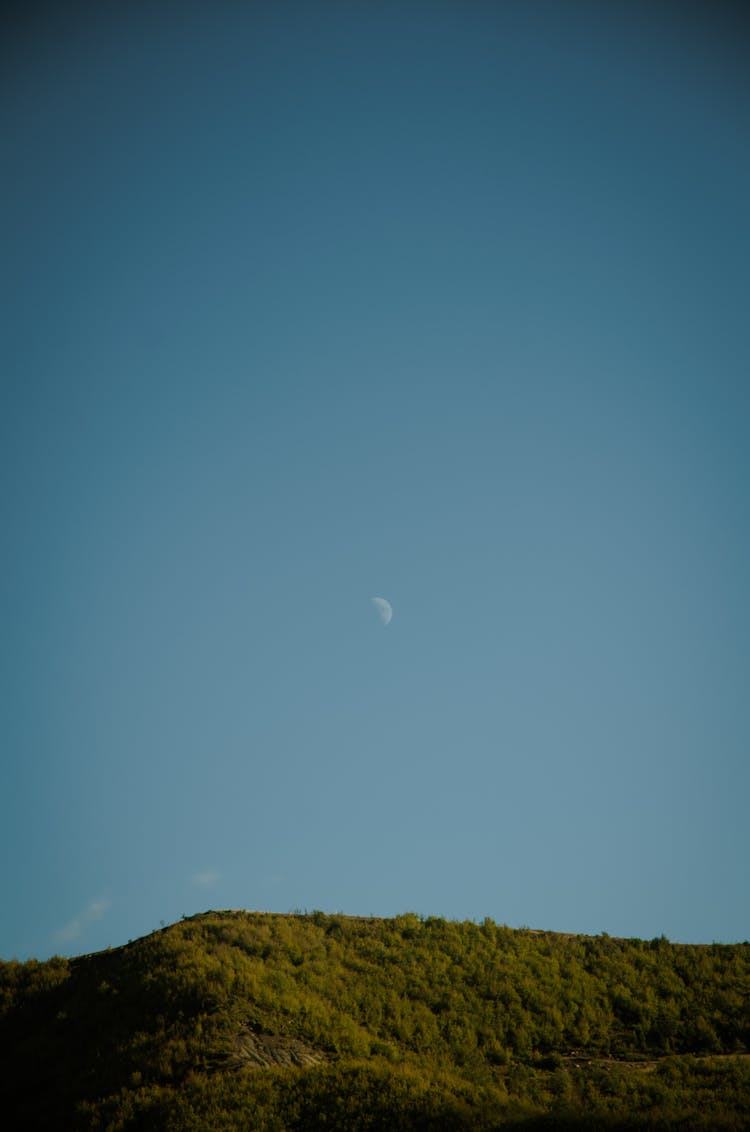 Blue Skies Over The Green Hill