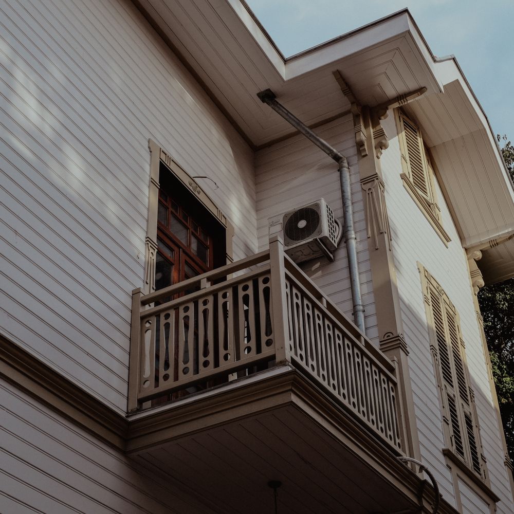 Exterior Painting in Kingston Vale — quality trade paint going on in two coats