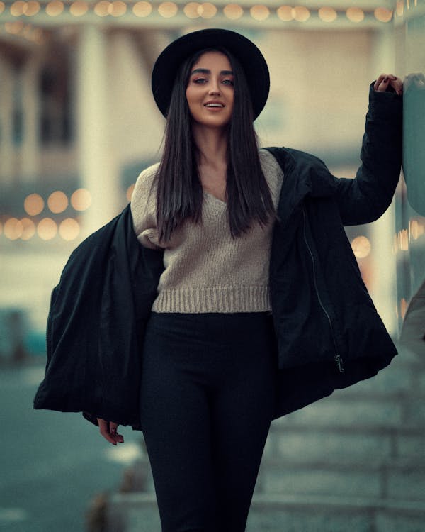 A Woman in Black Jacket and Black Pants With Black Hat · Free Stock Photo