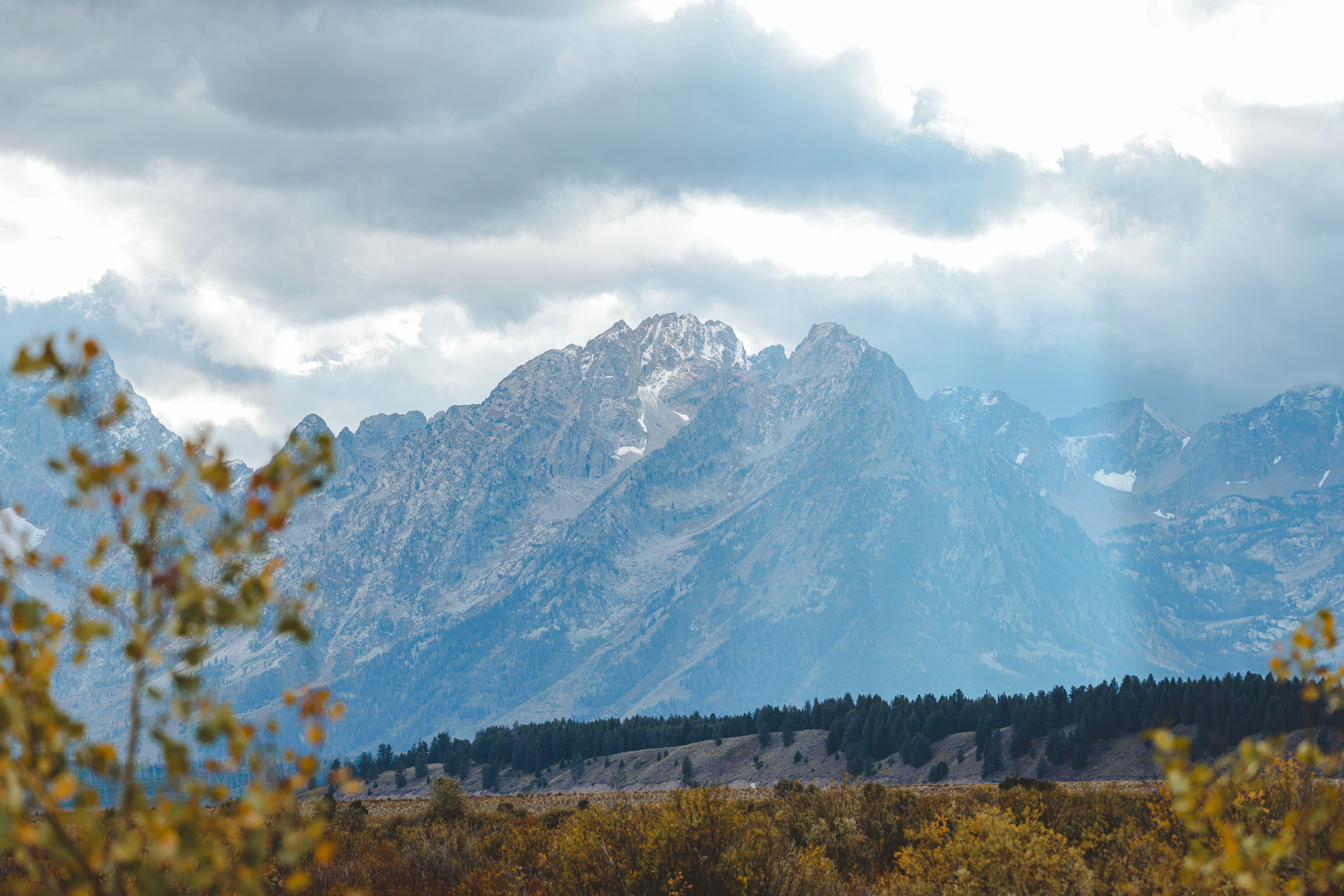 View of Rocky Mountain Under Cloudy Sky · Free Stock Photo