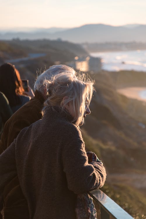 An Elderly Man and Woman Looking at View