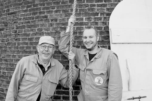 Men Holding on to a Rope