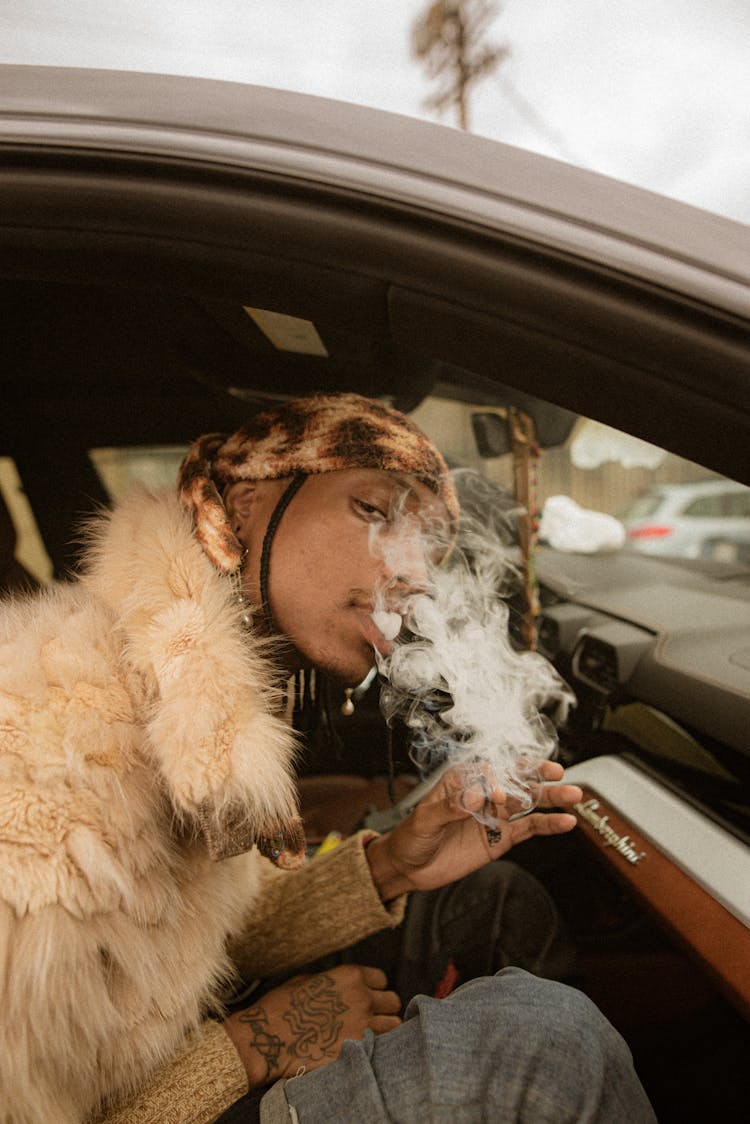 Man Smoking In Car