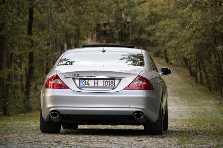 Silver Luxury Car Parked On A Driveway