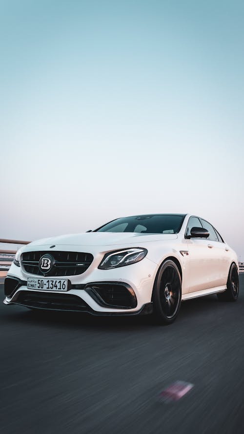 Photo of White Mercedes-Benz on Road