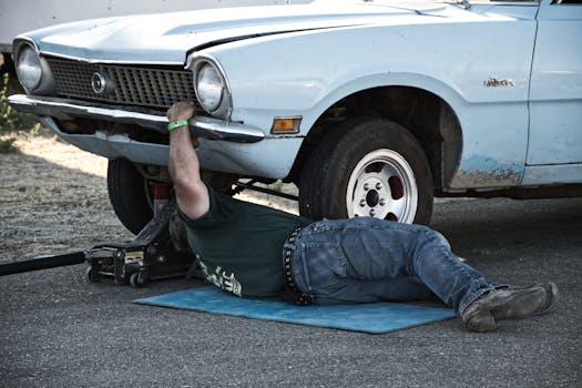 Man Working Under His Car