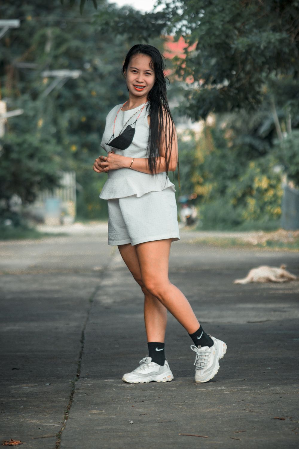 A Woman Standing on the Street · Free Stock Photo