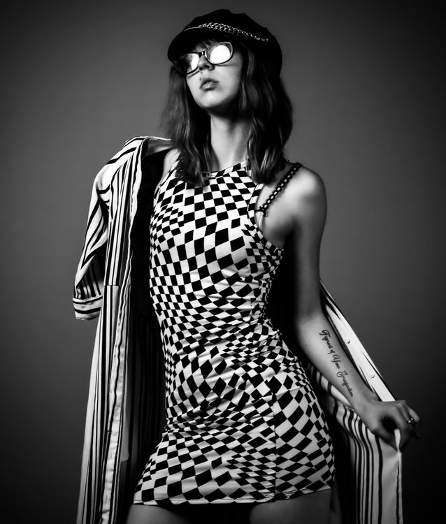 Woman in Black and White Checkered Dress Free Stock Photo Woman in Black and White Checkered Dress Free Stock Photo