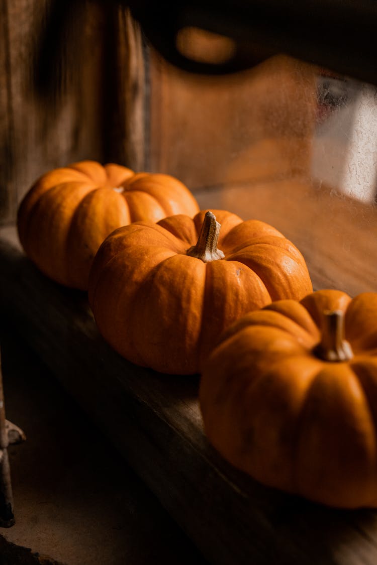 Orange Pumpkin On Wood