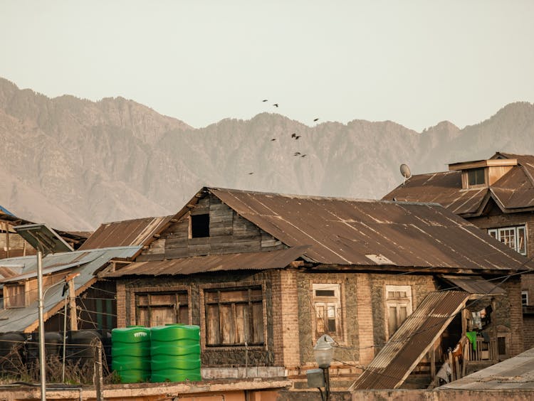 Brown Wooden House Near Mountain