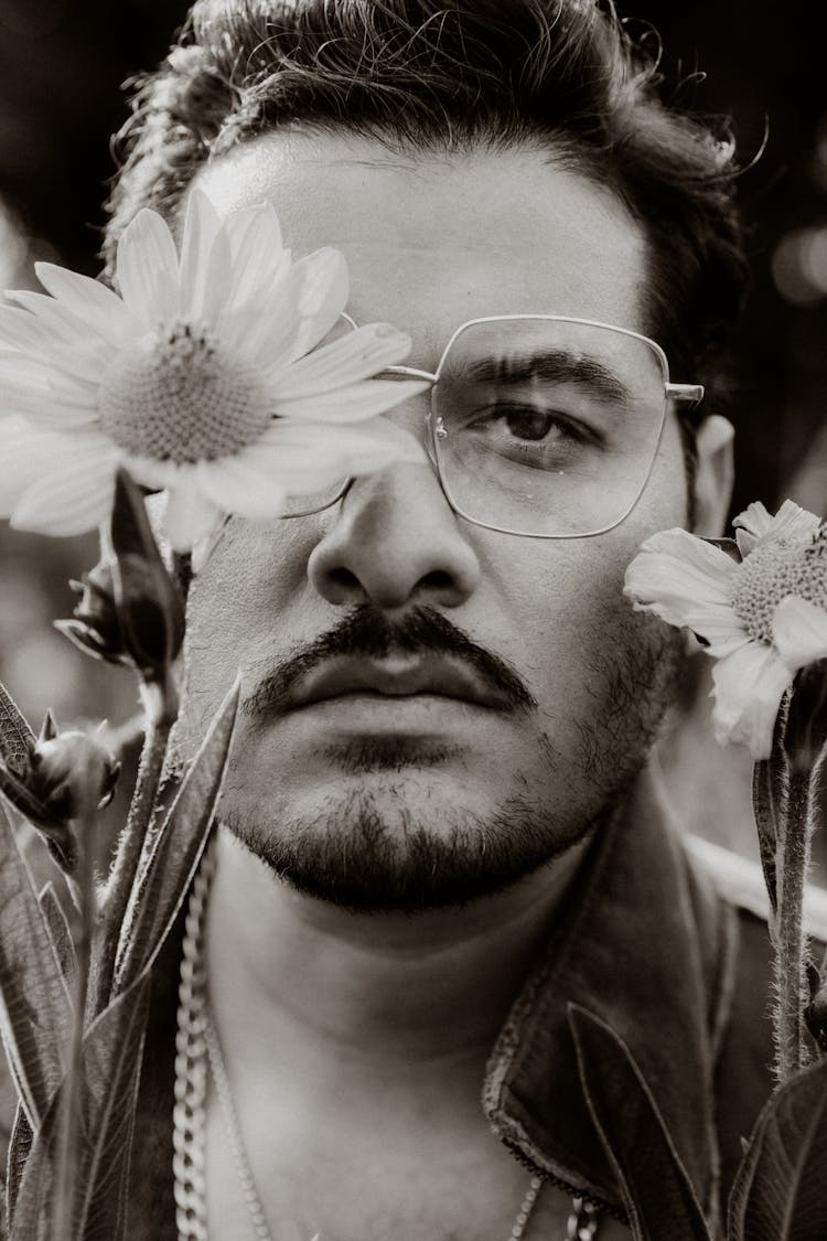 Man In Glasses Posing With Flower