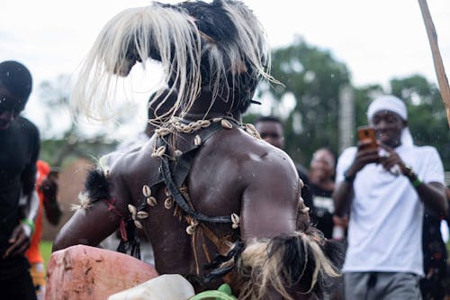Black Man in Traditional Tribal Costume on Festival