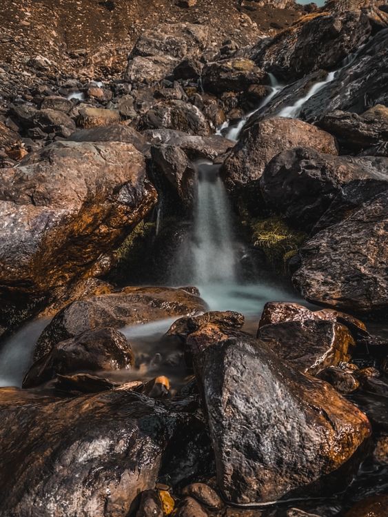 Water Cascading through Rocks · Free Stock Photo