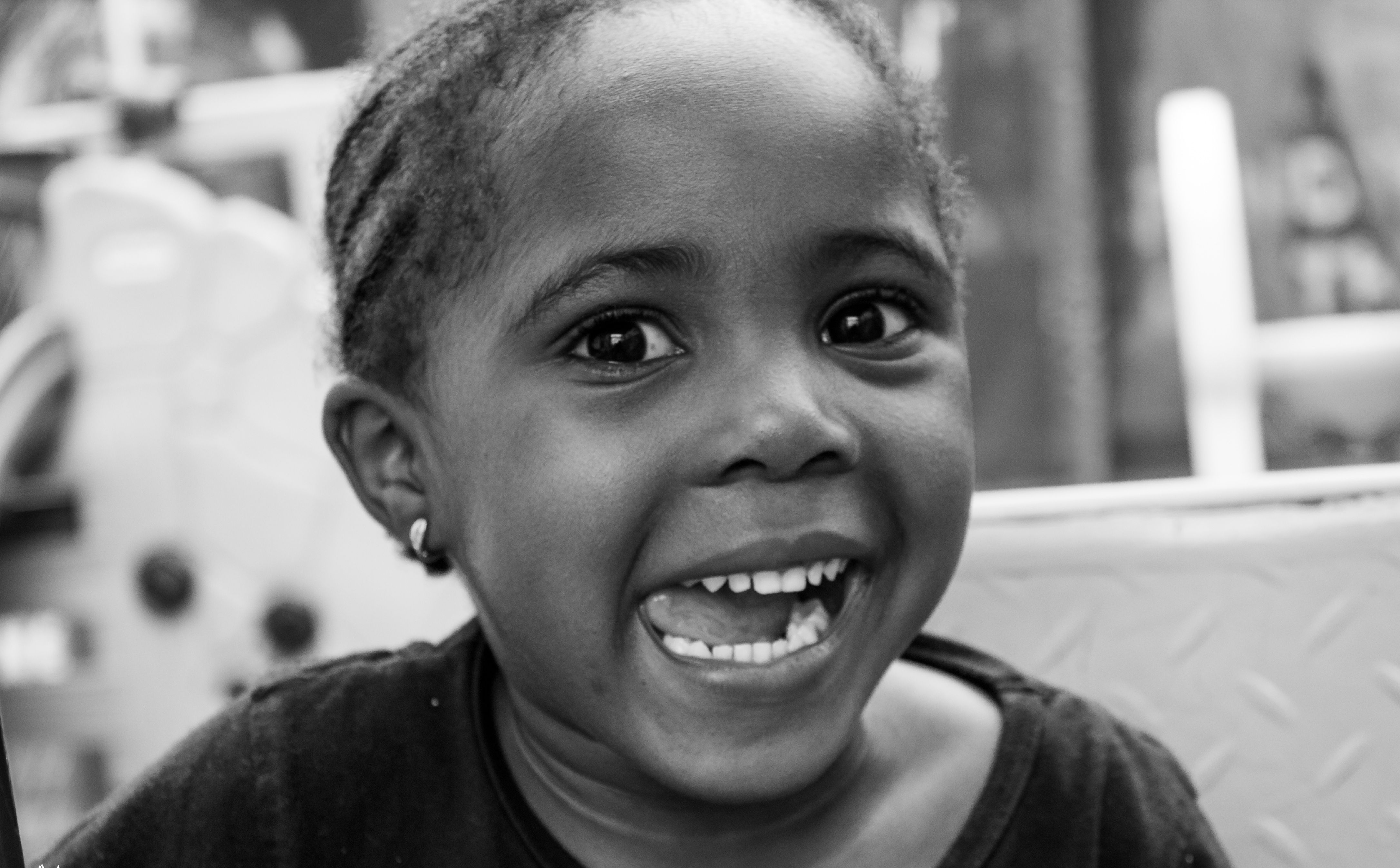 Black and White Portrait of a Young Girl Smiling · Free Stock Photo