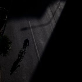 Rider on a road after dark — photo by Andy Urdaneta on Pexels