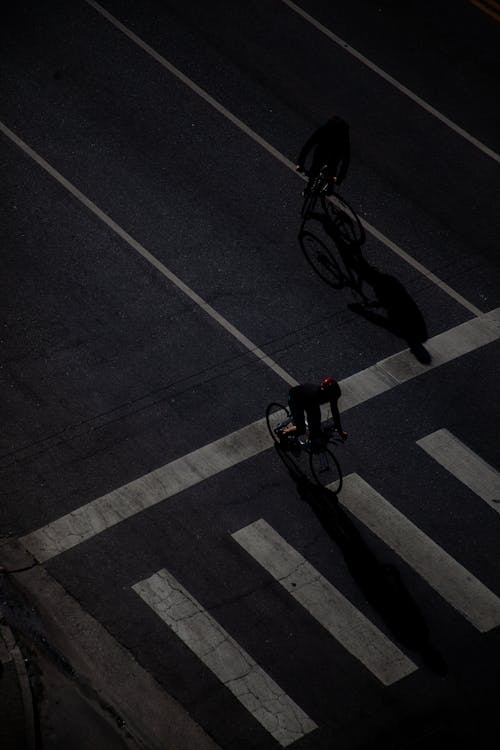 Aerial View of People Riding Bicycle