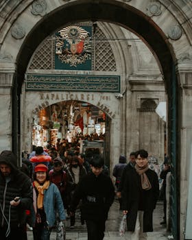 A busy day at the historic Grand Bazaar in Istanbul, filled with tourists and locals.