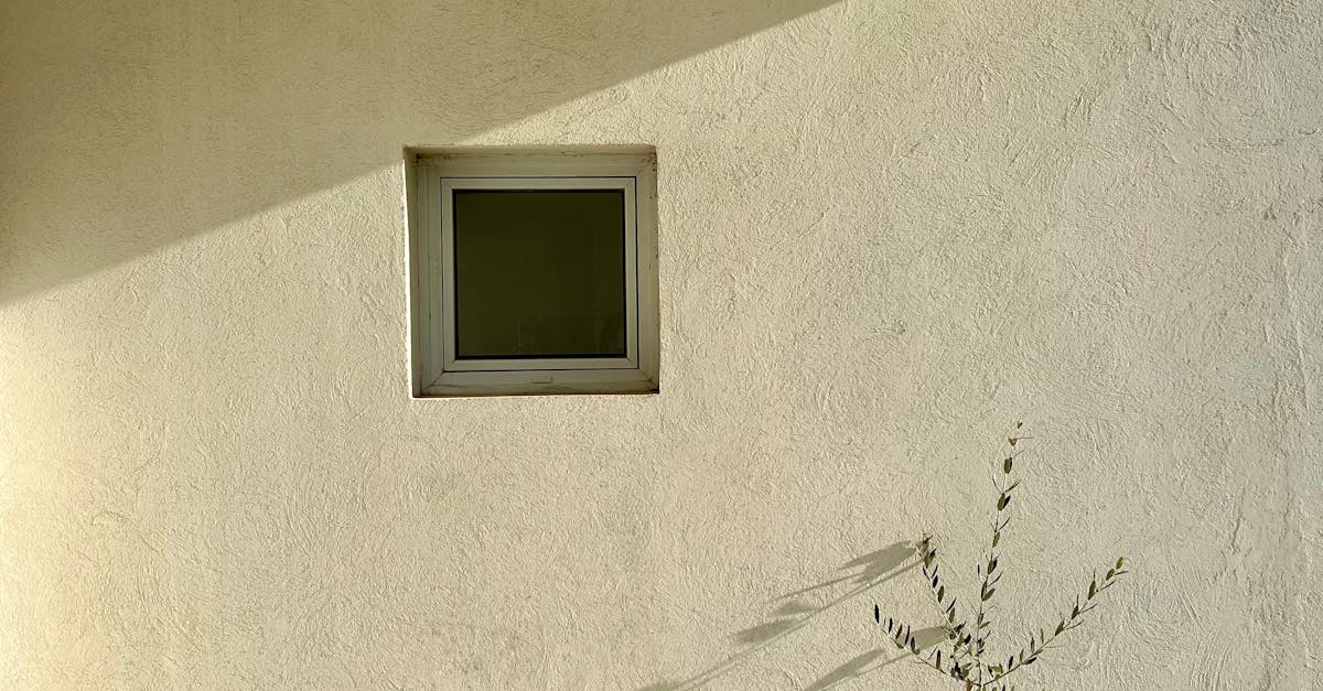 Square Glass Window on a Wall · Free Stock Photo
