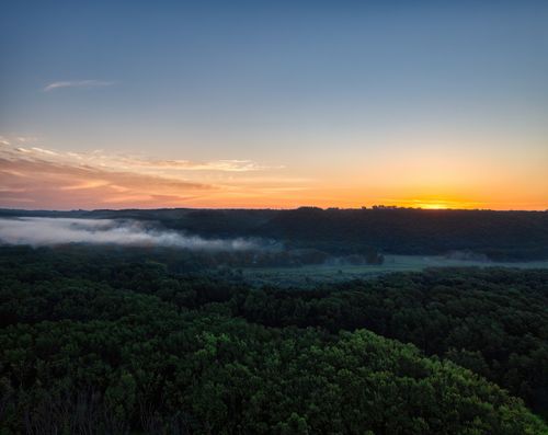 Free Aerial view of the Maiden Rock forest during a breathtaking sunrise in Wisconsin. Stock Photo
