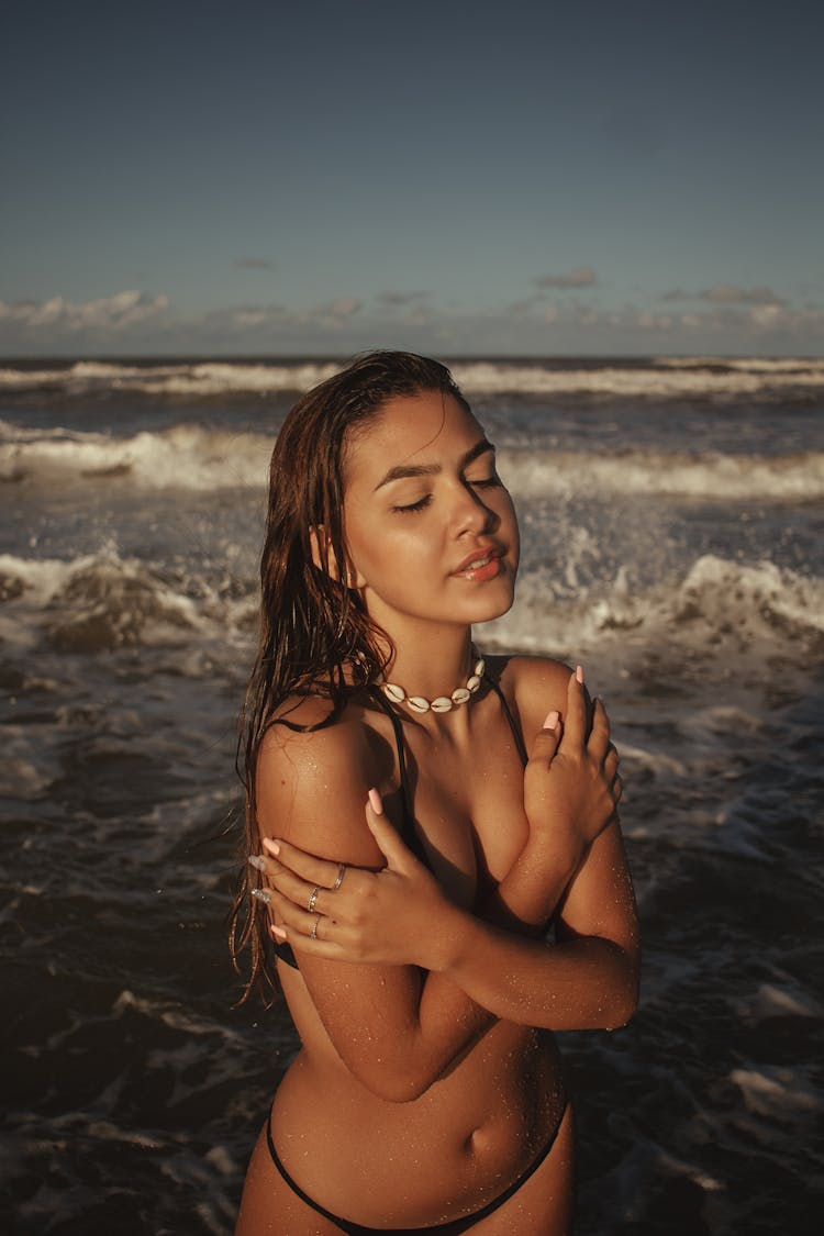 Brunette Woman Wearing Bikini On Beach