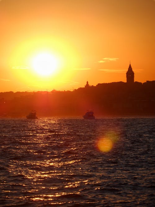 Photos gratuites de bateaux, coucher de soleil, horizon