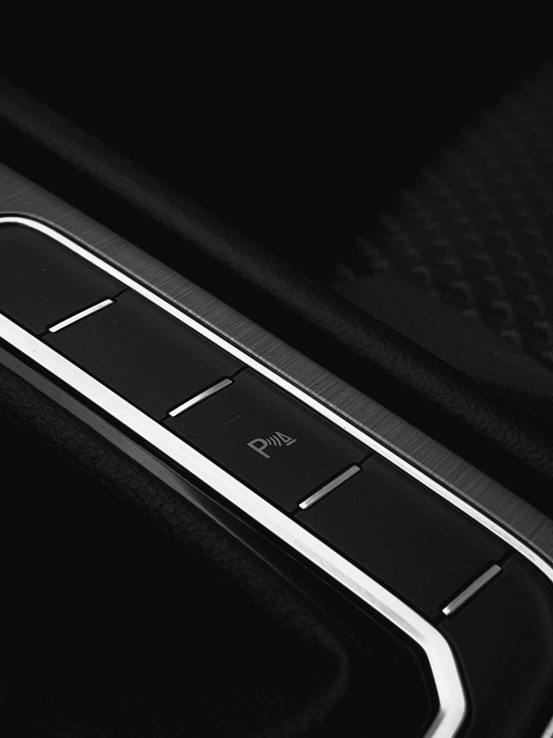Close-up of car dashboard buttons and center console controls