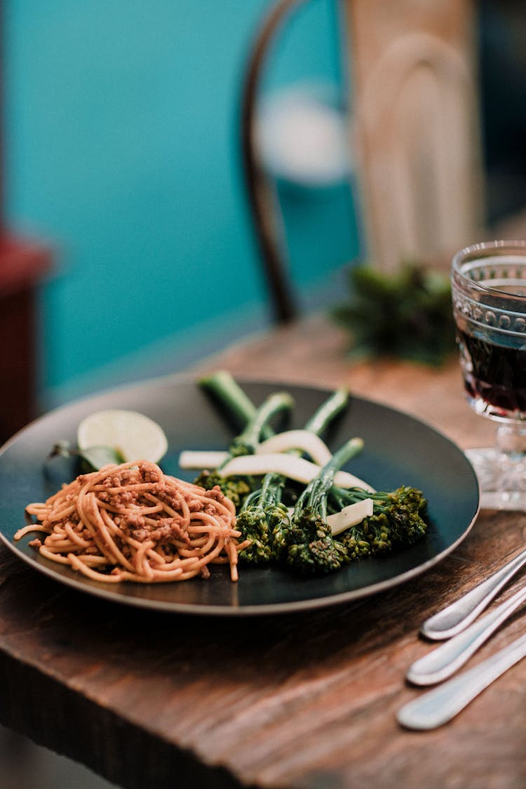 Spaghetti And Broccolini On A Ceramic Plate