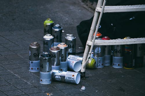 Spray Can on Gray Concrete