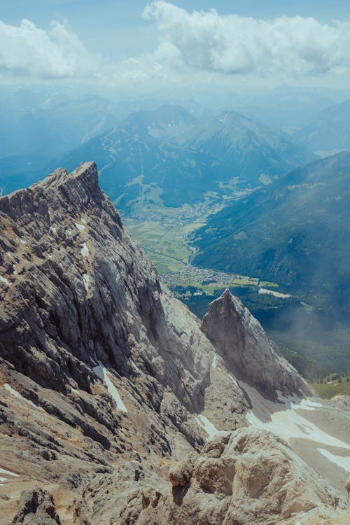 A Rocky Mountain Under the Cloudy Sky