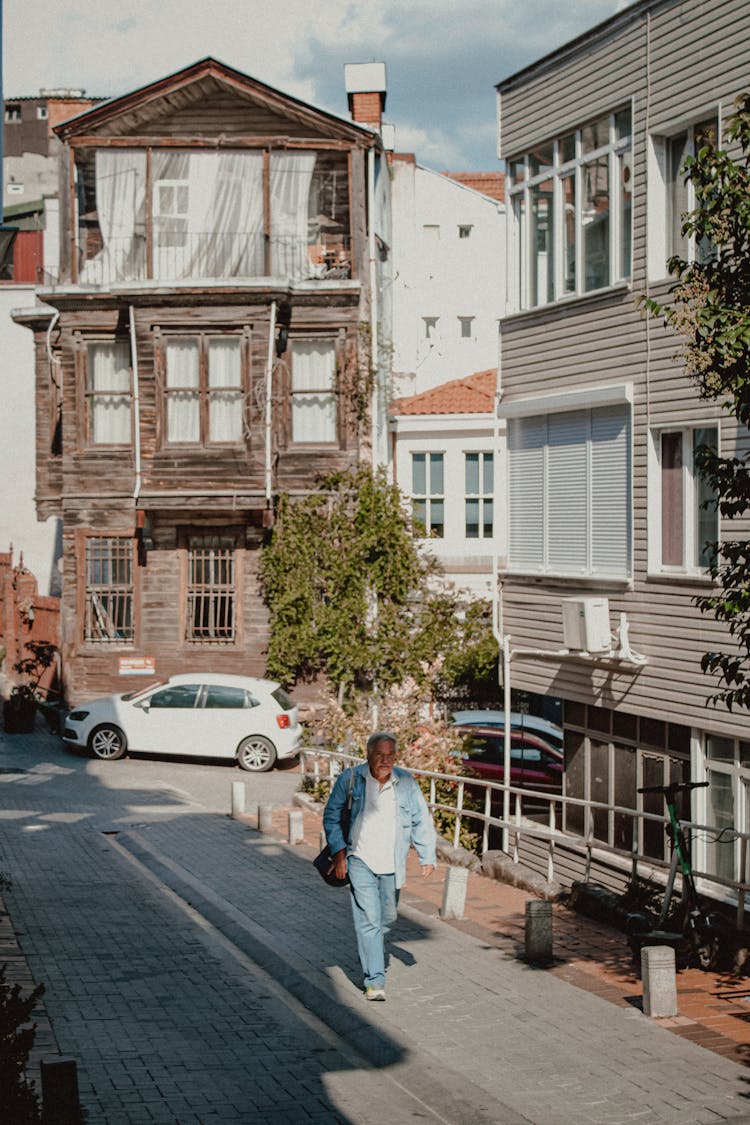 Man Walking Small Town Street