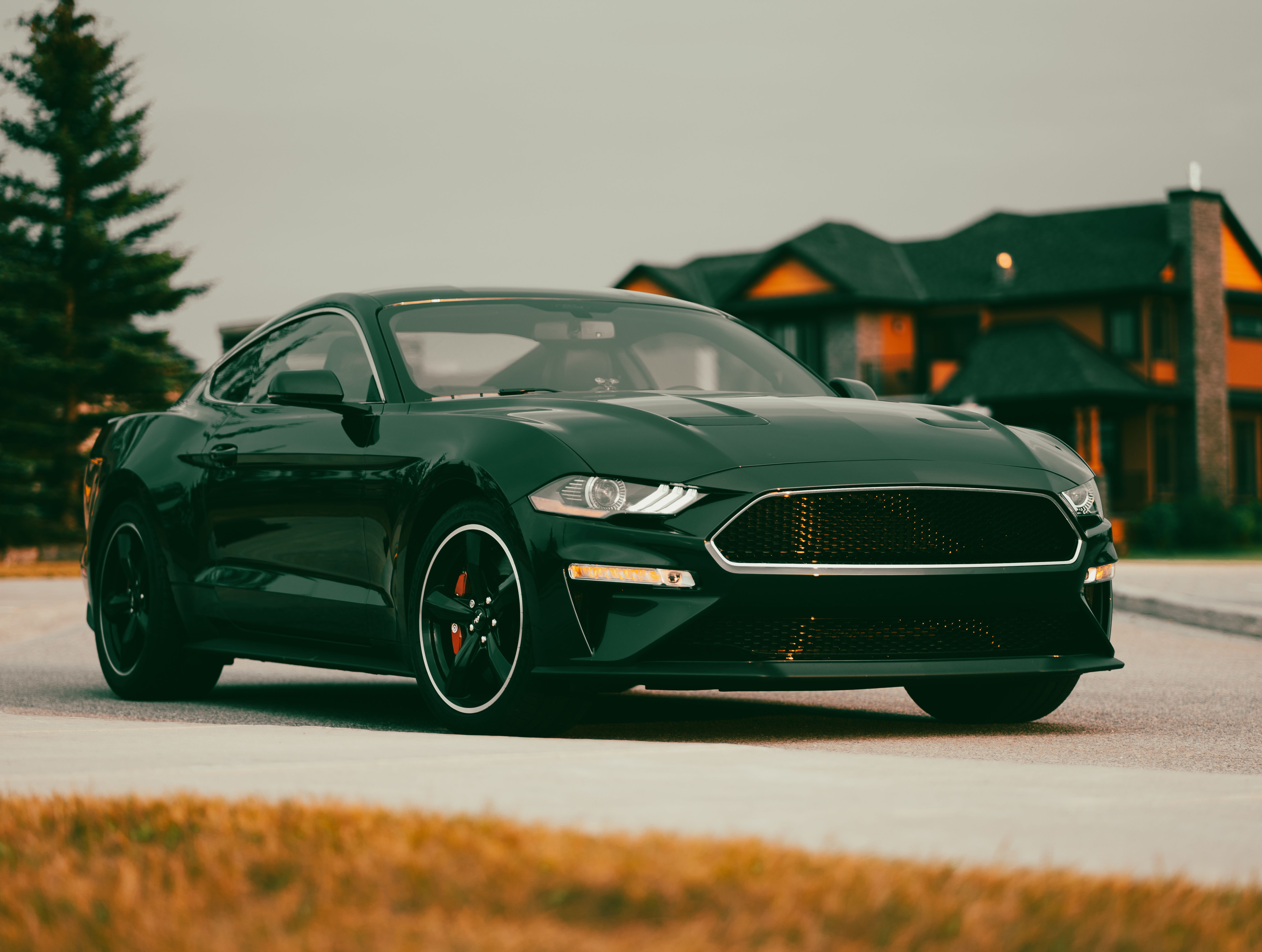 Black Ford Mustang representing higher-credit vehicle financing options in Canada