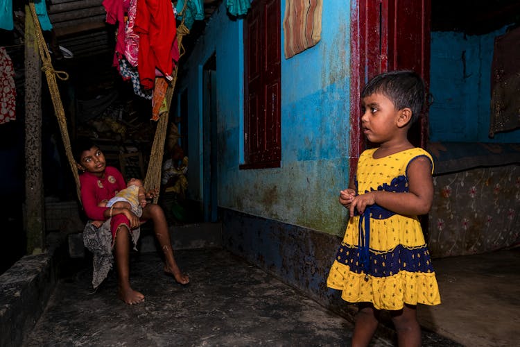 Little Children In Poor House In Village