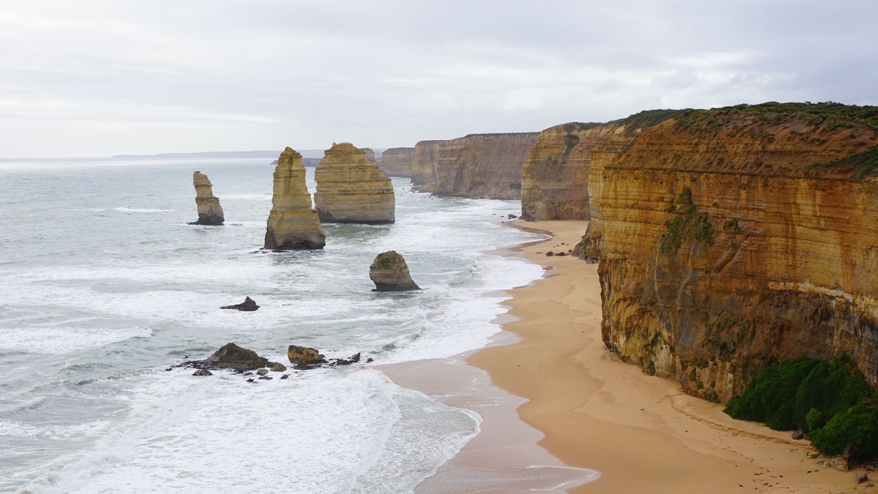 The Twelve Apostles rising from the Southern Ocean along a longer Australian coastal journey