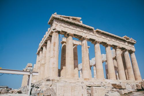 Free Explore the ancient beauty of the Parthenon in Athens under a clear blue sky. Stock Photo