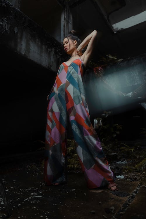 Woman in a Jumpsuit in an Abandoned Building