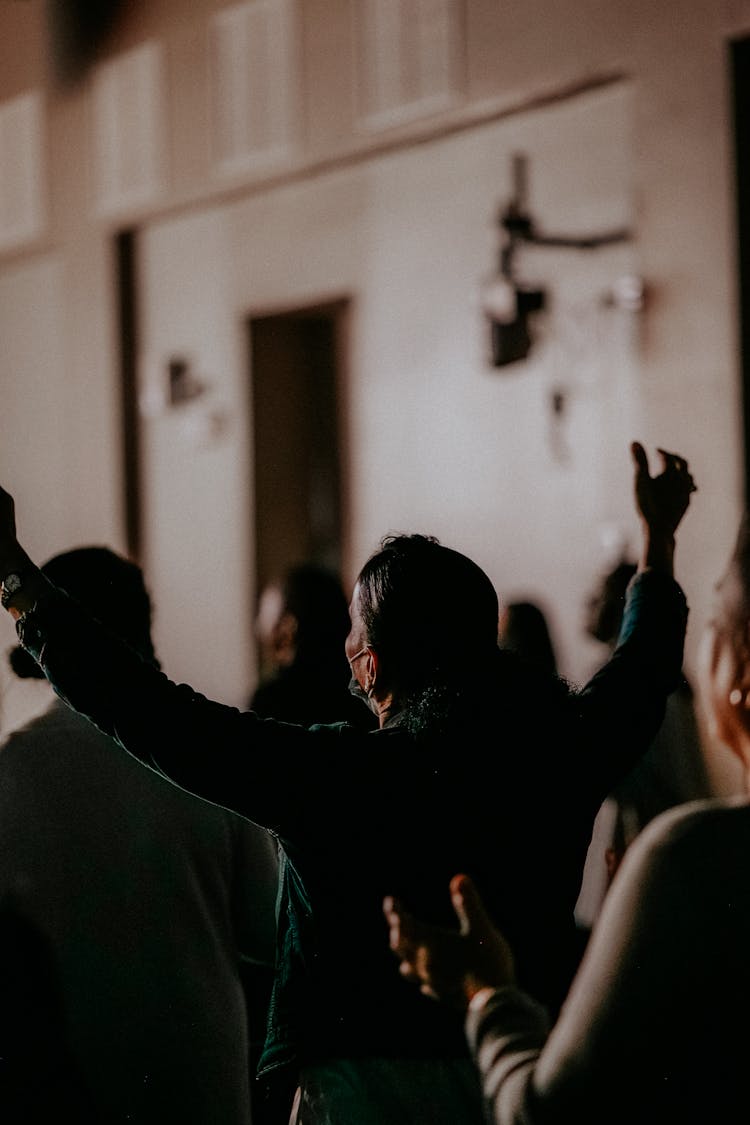 Group Of People Praying Together