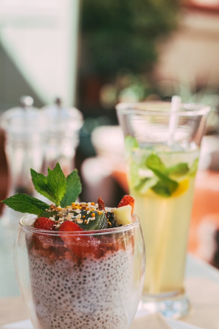 A Dessert And A Cocktail On A Table