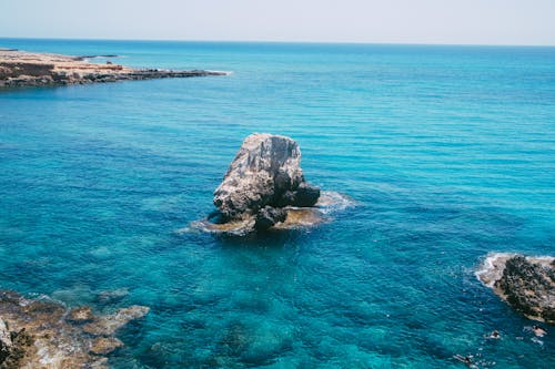 Foto d'estoc gratuïta de Costa, formació rocosa, mar